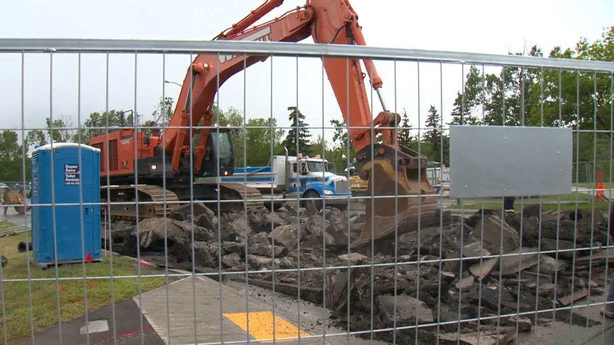 Crews work on water main repairs in northwest Calgary on June 17, 2024.