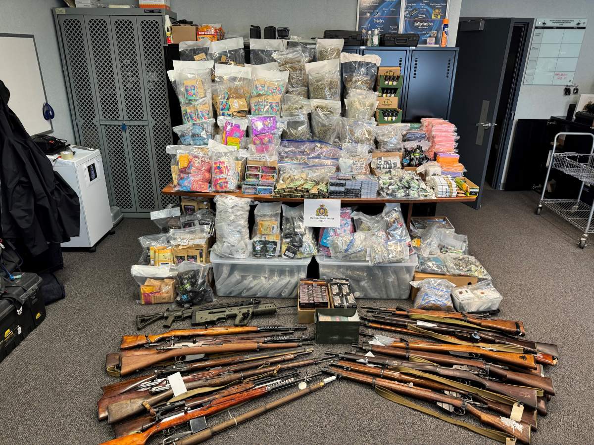 Police also seized 25 firearms from the Flin Flon home.