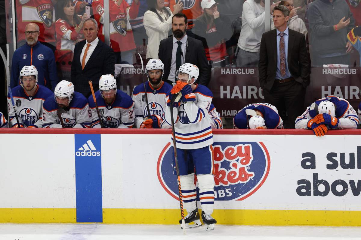 Edmonton Oiler Zach Hyman looks on while teammates react after their 2-1 loss against the Florida Panthers in Game Seven of the 2024 Stanley Cup Final at Amerant Bank Arena on June 24, 2024.