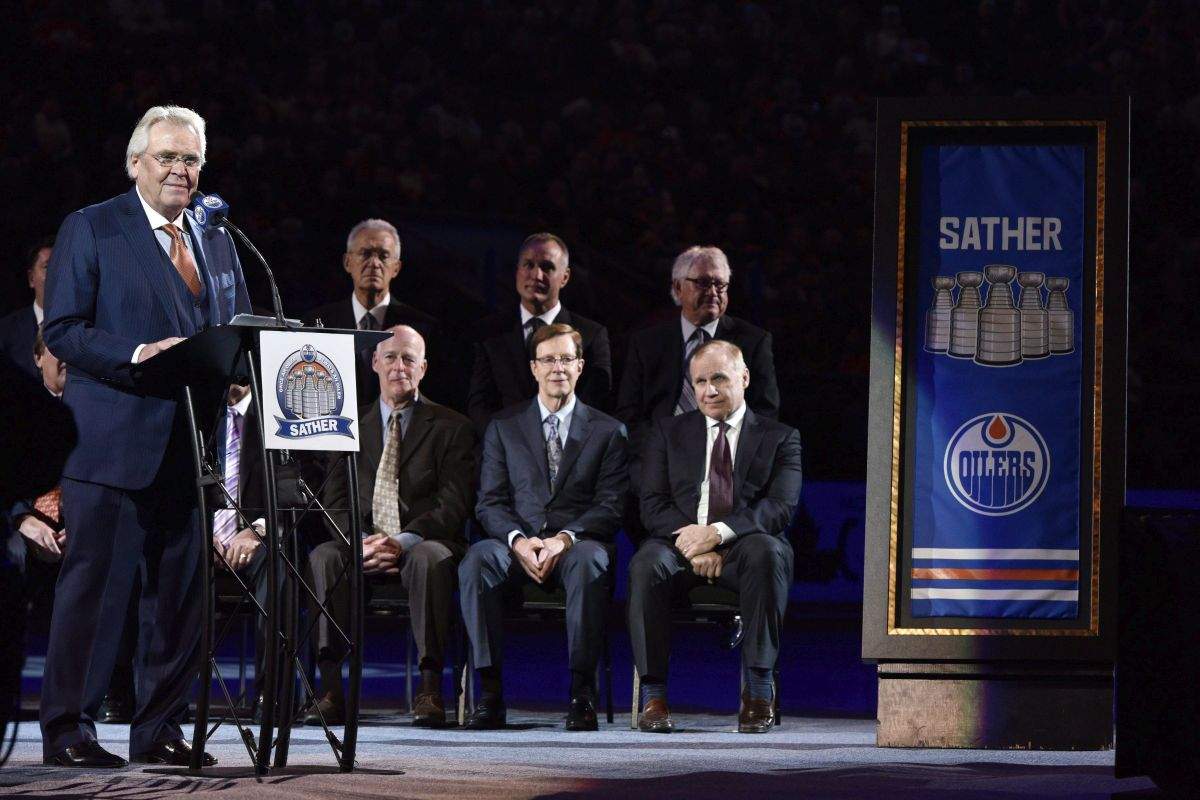 Former Edmonton Oilers coach Glen Sather is honored with a banner raising prior to the NHL hockey game between the Edmonton Oilers and the New York Rangers, in Edmonton, Alta., on Friday, December 11, 2015.