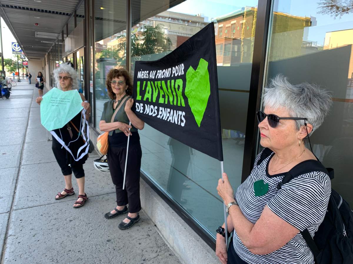 Environmental protesters outside of federal environmental minister Steven Guilbeault's riding office in Montreal.