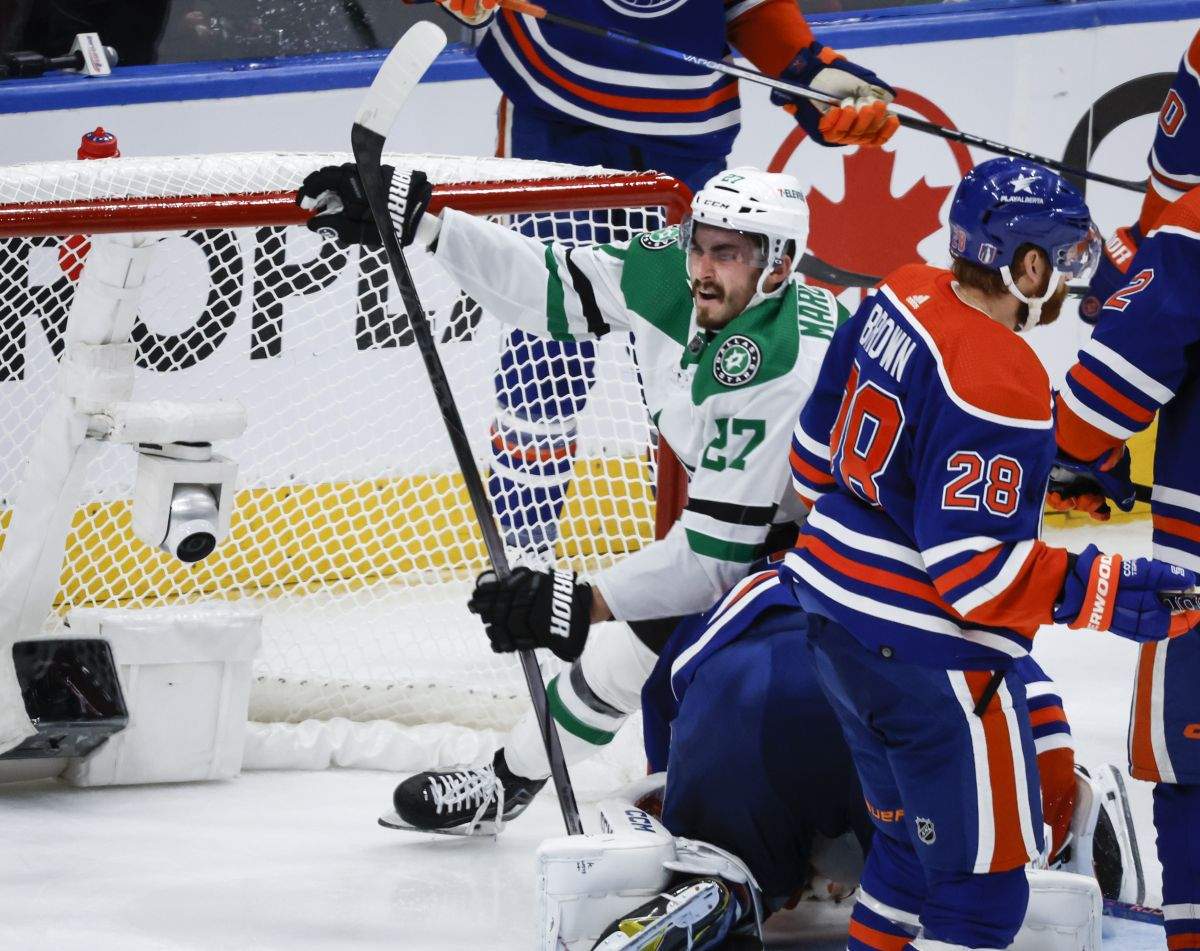 Dallas Stars forward Mason Marchment (27) celebrates his goal as Edmonton Oilers looks on during third period of Game 6 of the Western Conference finals of the NHL hockey Stanley Cup playoffs in Edmonton, Sunday, June 2, 2024.