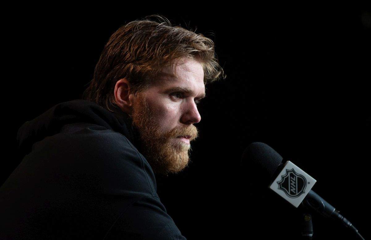 Edmonton Oilers' Connor McDavid (97) speaks during a press conference before they take on the Florida Panthers in Thursday's game 3 of the NHL Stanley Cup playoffs in Edmonton on Wednesday June 12, 2024.