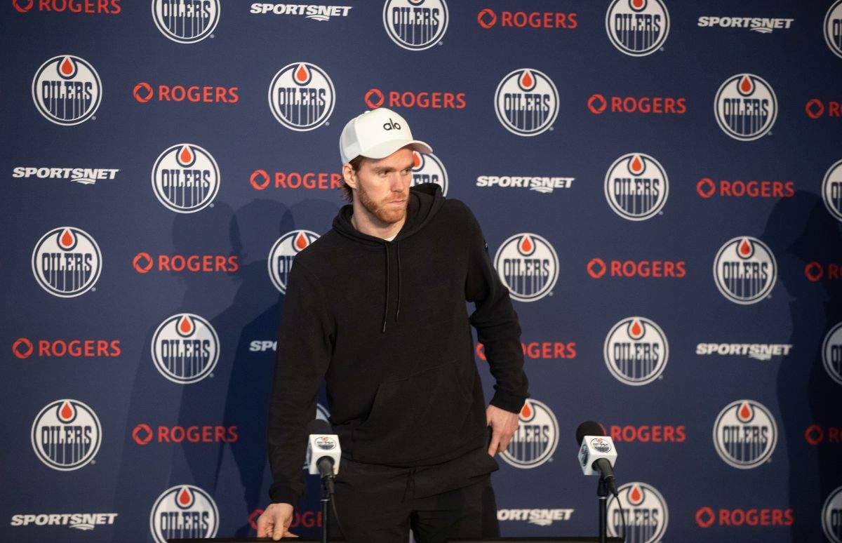 Edmonton Oilers' Connor McDavid makes his way to speak during a press conference after getting back from losing to the Florida Panthers in Game 7 of the NHL Stanley Cup final, in Edmonton on Wednesday June 26, 2024.