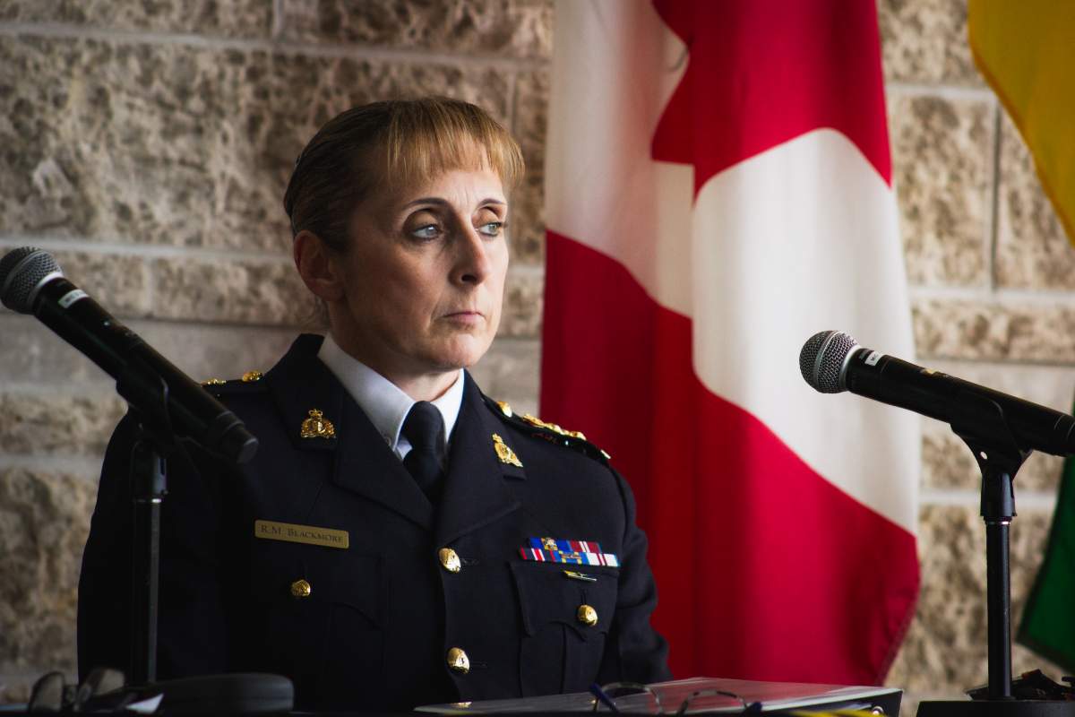 Saskatchewan RCMP assistant commissioner Rhonda Blackmore sits at the release of an internal review into how the police force responded to the James Smith Cree Nation mass stabbings.