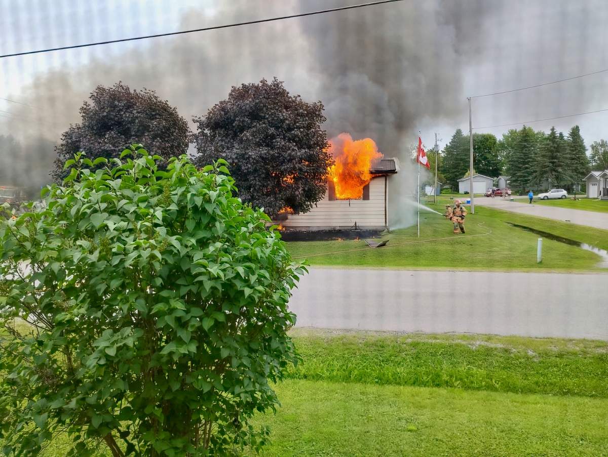 Kawartha Lakes Fire and Rescue crews battle the fire on June 26, 2024.