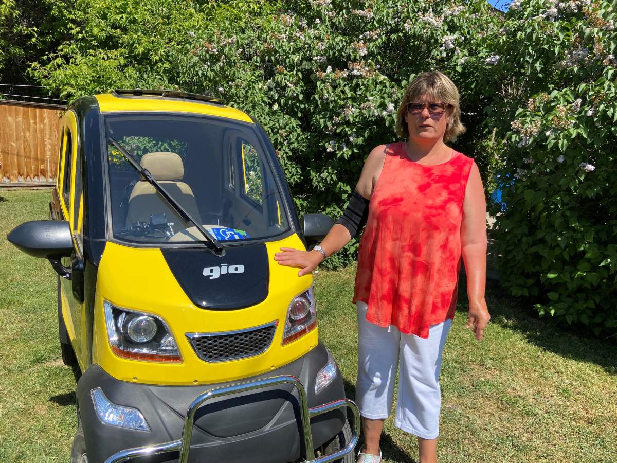 Olds resident Jennifer Clarke has stopped using her enclosed mobility scooter since being given a warning on June 6, 2024.