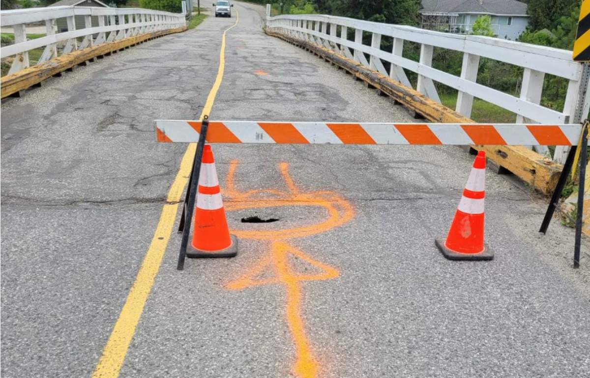 A small sinkhole has appeared on a Spallumcheen area bridge, prompting its closure. .