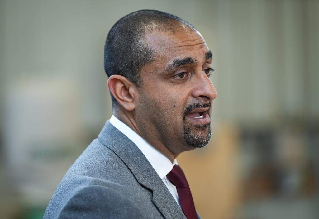Minister of Housing Ravi Kahlon speaks during an announcement in Burnaby, B.C., on Monday, May 27, 2024. A Vancouver Downtown Eastside housing project is being expanded from one city lot to four and will now include community health and social services. THE CANADIAN PRESS/Darryl Dyck.