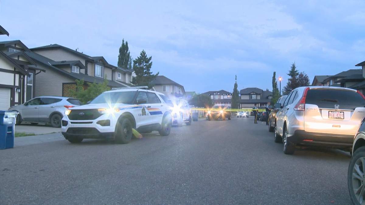 Police investigate after two homes were shot at in Airdrie, Alta., on July 29, 2024.