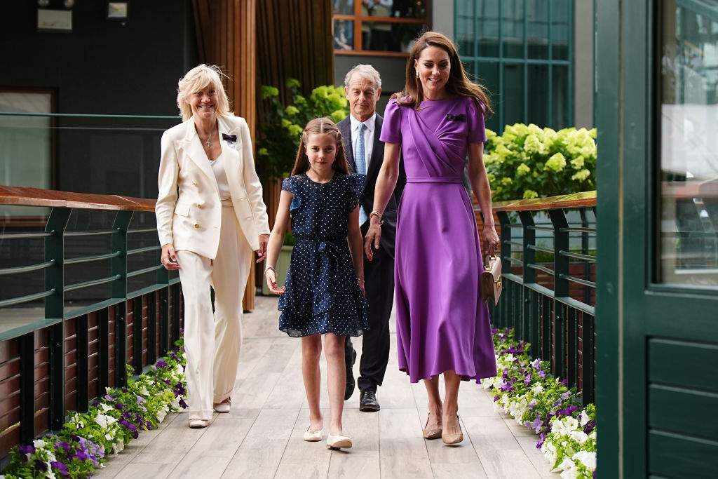 Catherine, Princess of Wales (R) and Princess Charlotte (2nd L) arrive at the All England Lawn Tennis and Croquet Club in Wimbledon, south west London, on day fourteen of the Wimbledon Tennis Championships on July 14, 2024 in London, England. The Princess of Wales will present the trophy to the winner of the men's final.