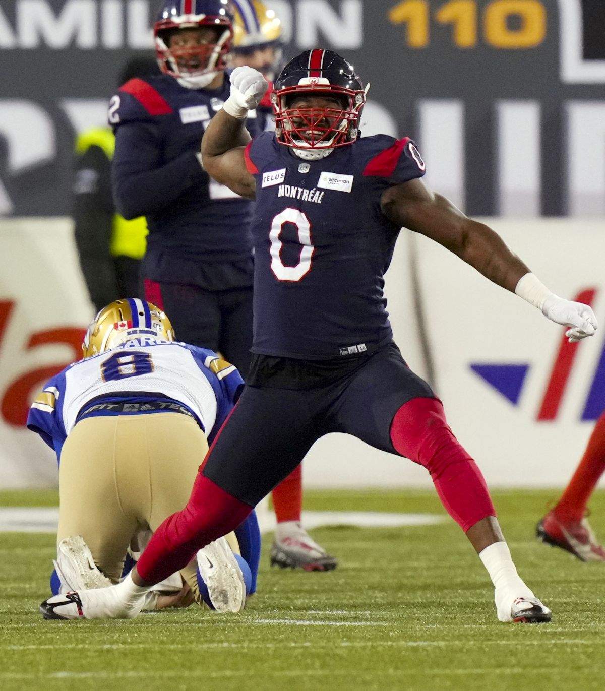 Montreal Alouettes defensive end Shawn Lemon (0) celebrates a sack against Winnipeg Blue Bombers quarterback Zach Collaros (8) during the 110th CFL Grey Cup football action in Hamilton, Ont., on Sunday, November 19, 2023.