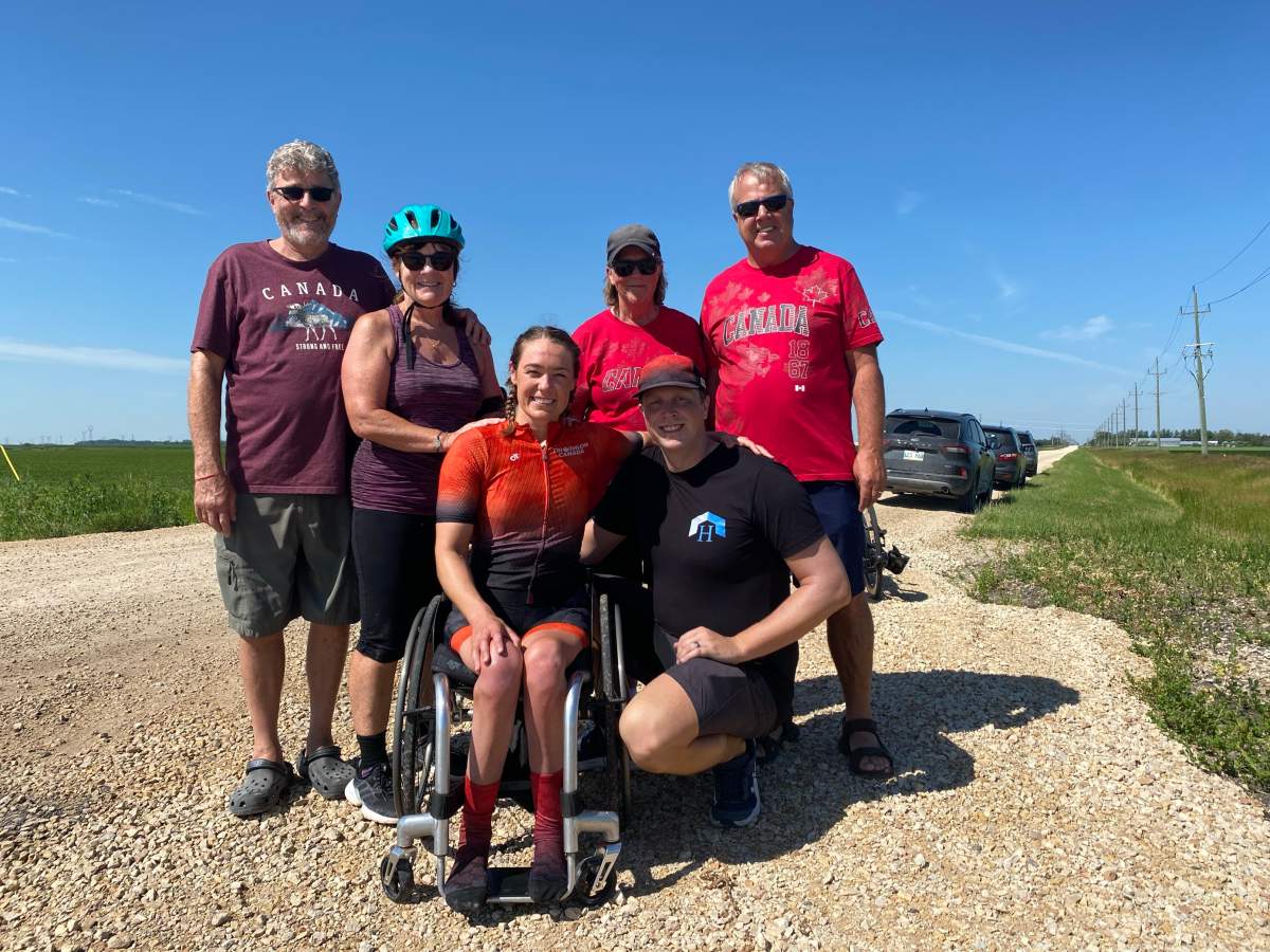 Photo of Leanne Taylor with her Husband Scott and her family