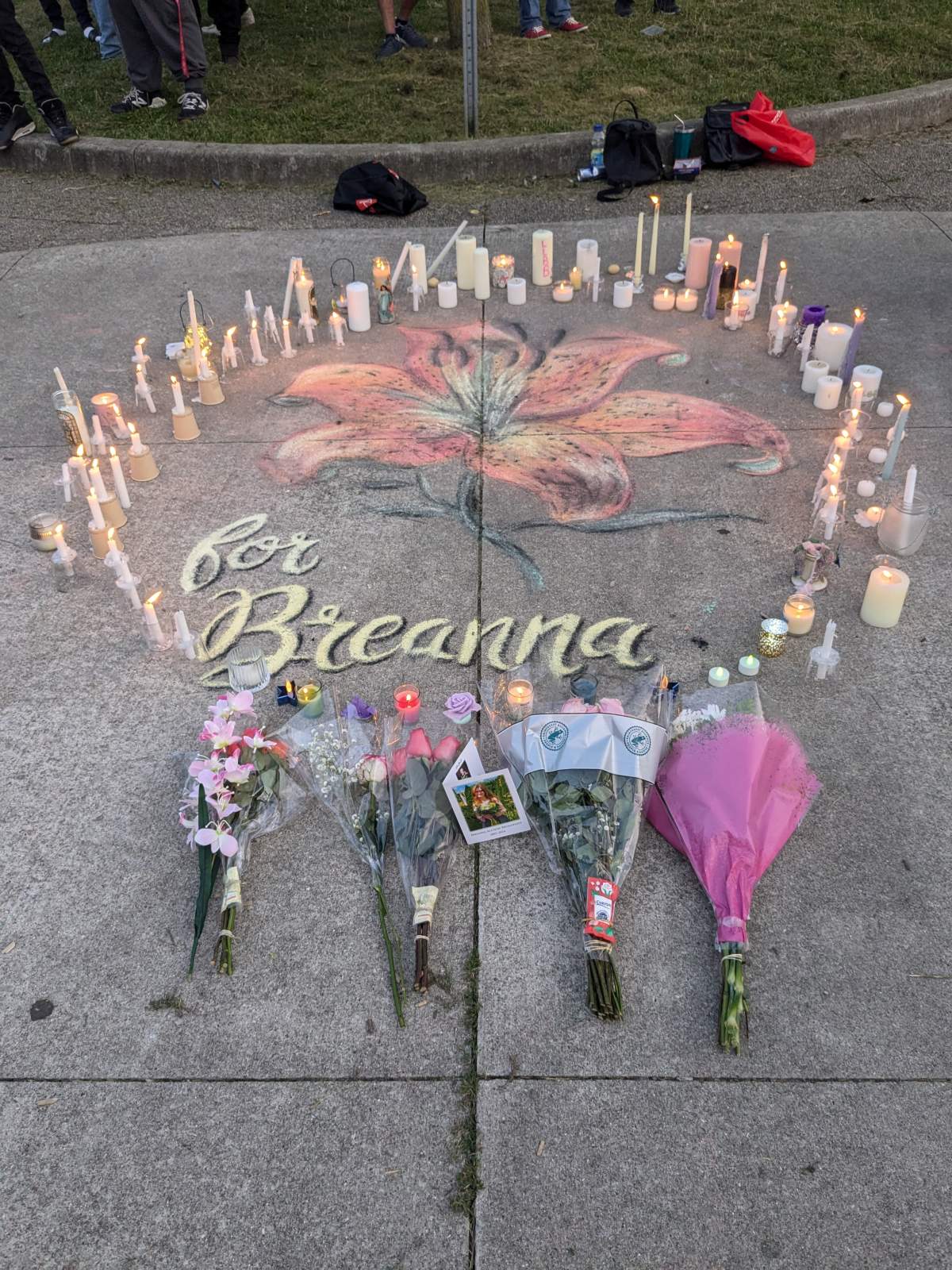 Chalk art of a tiger lily at Ed Blake park for Breanna Broadfoot.