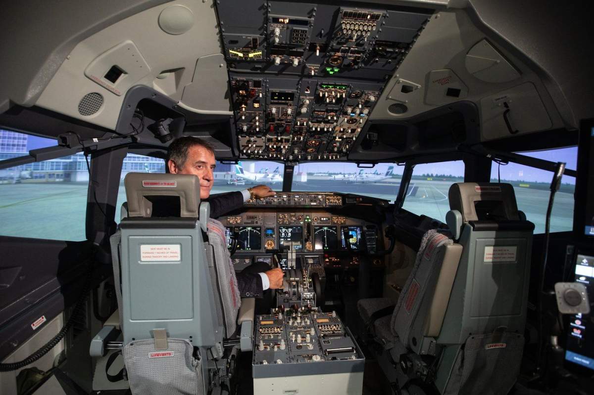 Chief pilot Gerald Skocdopole with Canadian North flies the airline's new state-of-the-art Boeing 737NG full-flight simulator in Edmonton, on Wednesday July 17, 2024.