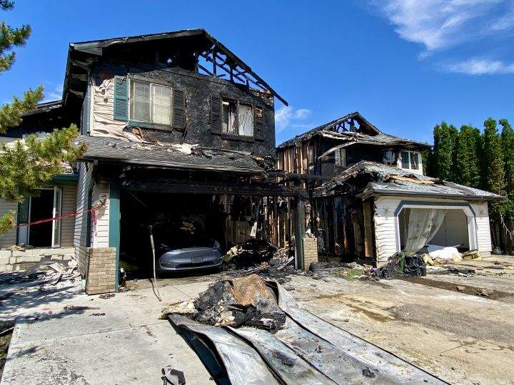 A look at two homes in southeast Edmonton on July 8, 2024, one day after they were damaged by fire. Edmonton Fire Rescue Services said crews were called to a blaze in the area of 41st Street and 37th Avenue just before midnight on July 7, 2024.