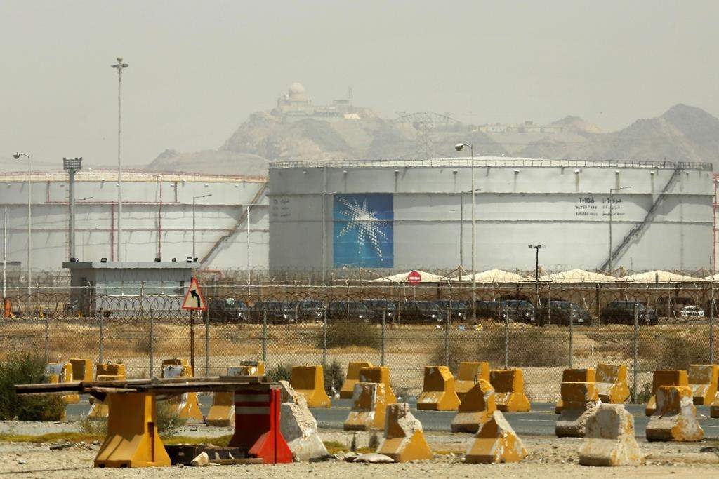 FILE - Storage tanks are seen at the North Jeddah bulk plant, an Aramco oil facility, in Jeddah, Saudi Arabia.