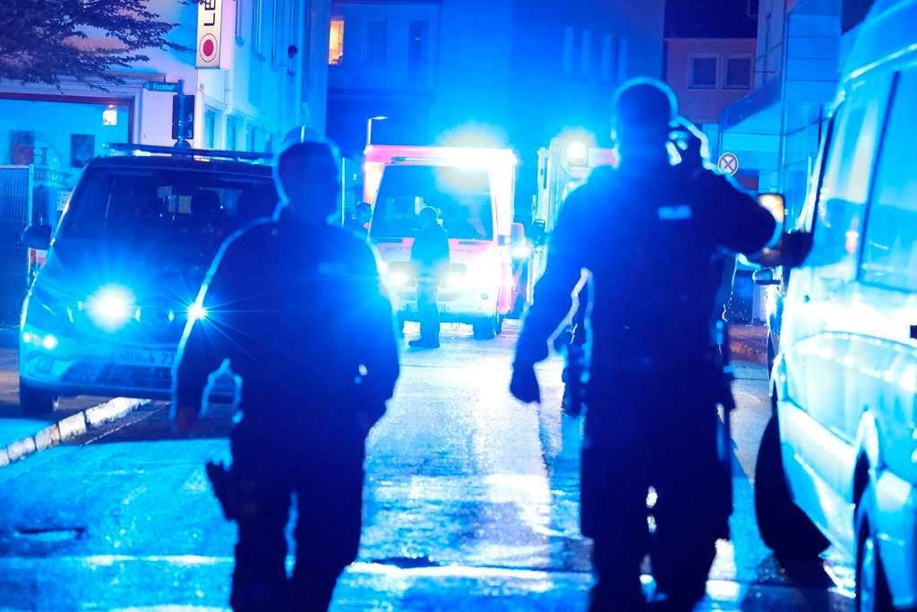 Police and ambulances near the scene where people were killed and injured in an attack at a festival in Solingen, western Germany, the German dpa news agency reported, Friday, Aug. 23, 2024. (Gianni Gattus/dpa via AP).