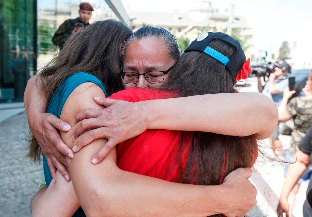 Families and supporters of four murdered women celebrate outside the Manitoba Law Courts after the guilty verdict of serial killer Jeremy Skibicki is read in a courtroom in Winnipeg on July 11, 2024. Families and supporters of four Indigenous women who died at the hands of a serial killer are expected to address the man for the first time today in a Winnipeg courtroom.
