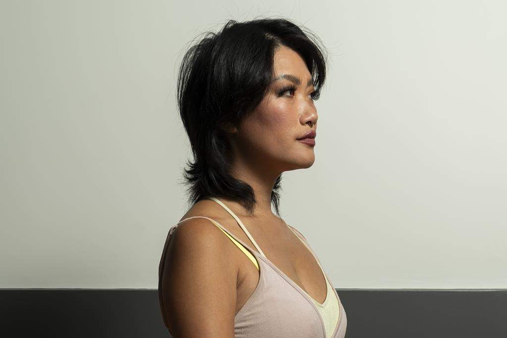 Author Jenny Heijun Wills poses for a portrait in Toronto, Tuesday, Aug. 27, 2024 on the release date of her latest book, titled Everything and Nothing At All. 