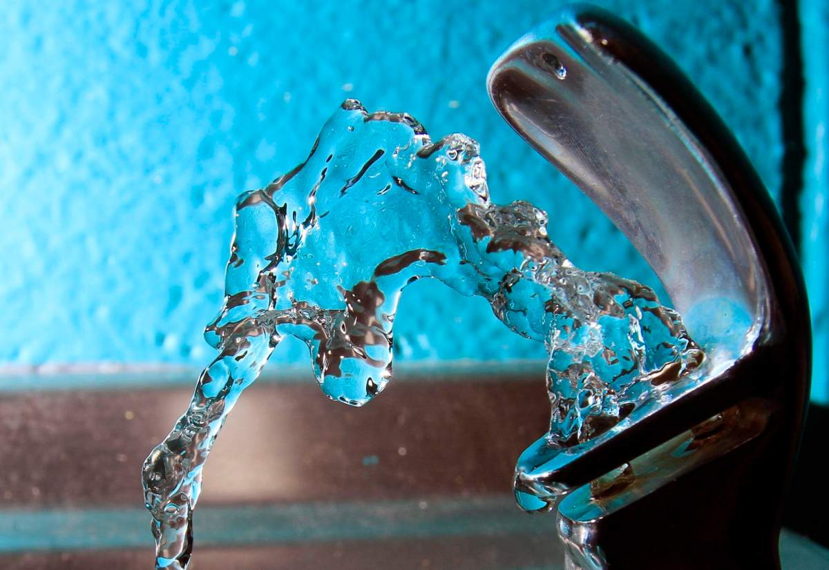 FILE - In this Friday Jan. 7, 2011 file photo, water flows from a water fountain at the Boys and Girls Club in Concord, N.H. A court will hear from a lawsuit in October 2019, seeking to scrap limits on a toxic chemicals in New Hampshire's public drinking water.