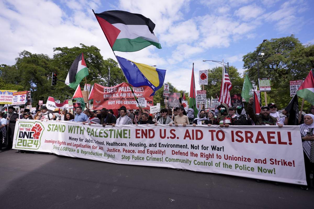 Protesters march to the Democratic National Convention after a rally at Union Park Monday, Aug. 19, 2024, in Chicago. (AP Photo/Alex Brandon)