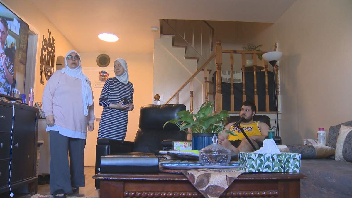 Sirin Elgundi, far left, stands with her family. Her son, Abdel Rahman Abdallah, was hit by a bullet during a shootout between Montreal police and a suspect on Aug. 4, 2024.