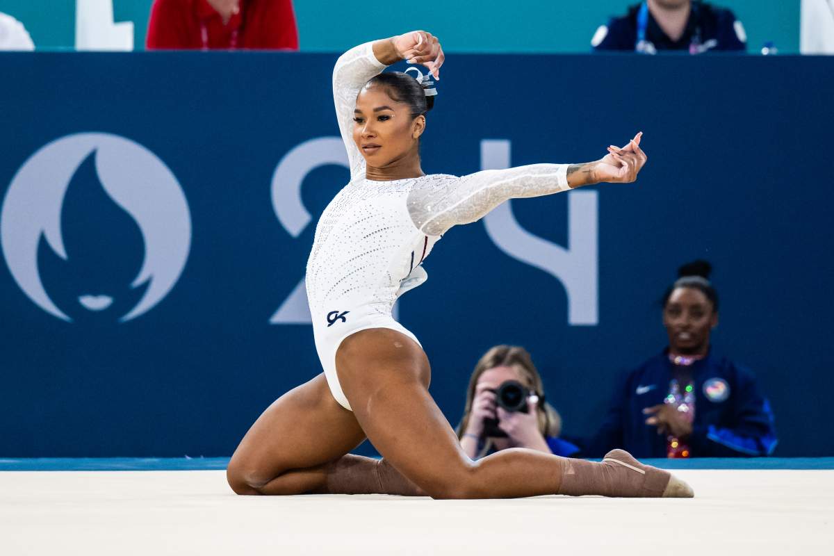 Jordan Chiles on floor.
