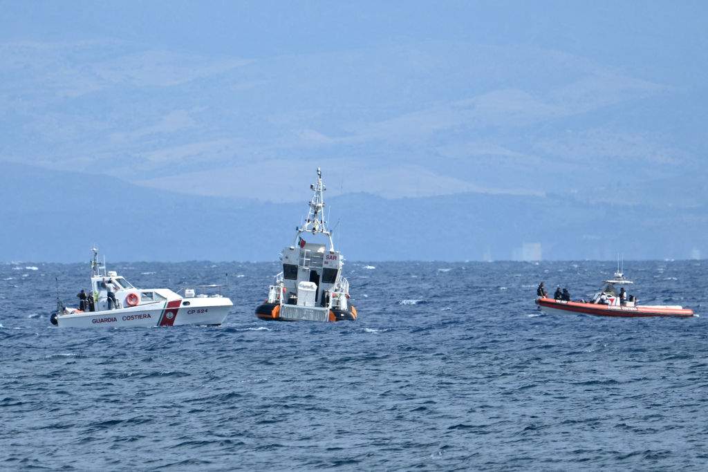 Rescue boats operate off Porticello, on August 20, 2024 near Palermo a day after the British-flagged luxury yacht Bayesian sank.