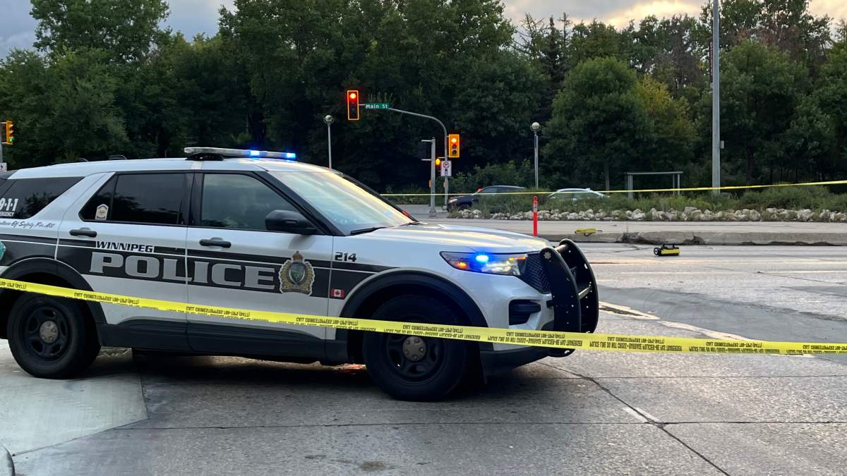 Winnipeg police block off a section of Mayfair Avenue at Main Street Thursday morning.
