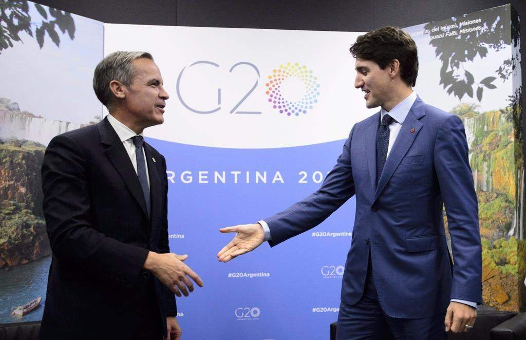 Prime Minister Justin Trudeau meets with then-Bank of England governor Mark Carney at the G20 Summit in Buenos Aires, Argentina on Friday, Nov. 30, 2018. THE CANADIAN PRESS/Sean Kilpatrick