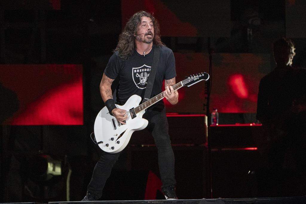 FILE - Dave Grohl of the Foo Fighters performs at Festival d'été de Québec, July 8, 2023, at Plains of Abraham in Quebec City. 