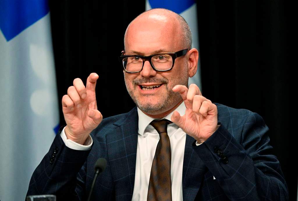 Quebecc ombudsman Marc-Andre Dowd responds to reporters' questions after he tabled his annual report Sept. 19, at he legislature in Quebec City. THE CANADIAN PRESS/Jacques Boissinot.