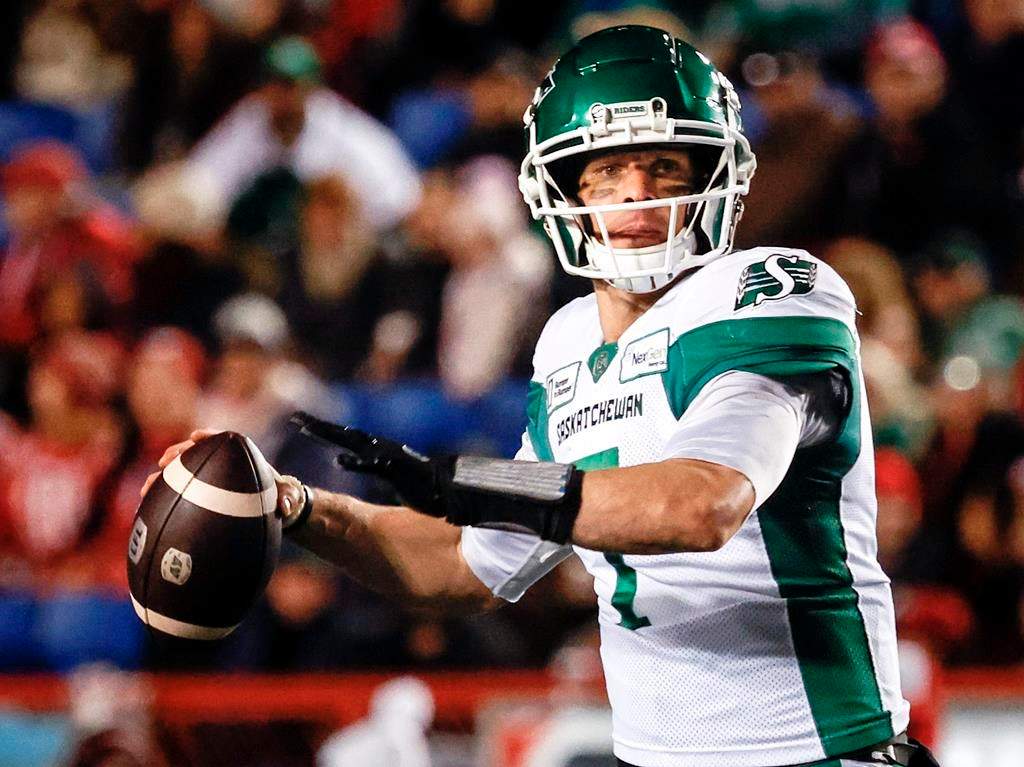Saskatchewan Roughriders quarterback Trevor Harris (7) looks for a receiver during second half CFL football action against the Calgary Stampeders in Calgary, Friday, Sept. 20, 2024. THE CANADIAN PRESS/Jeff McIntosh.