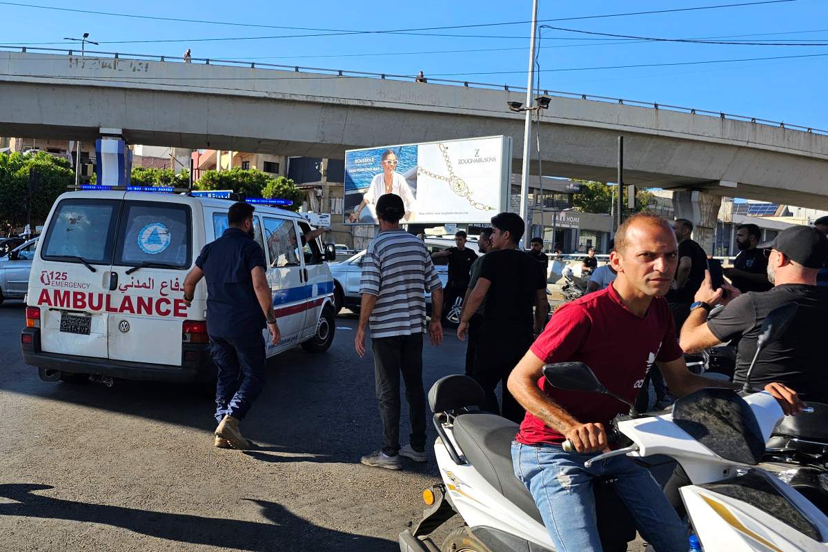 An ambulance carries wounded people whose handheld pager exploded, in Beirut, Lebanon, Tuesday, Sept. 17, 2024. (AP Photo/Hassan Ammar)