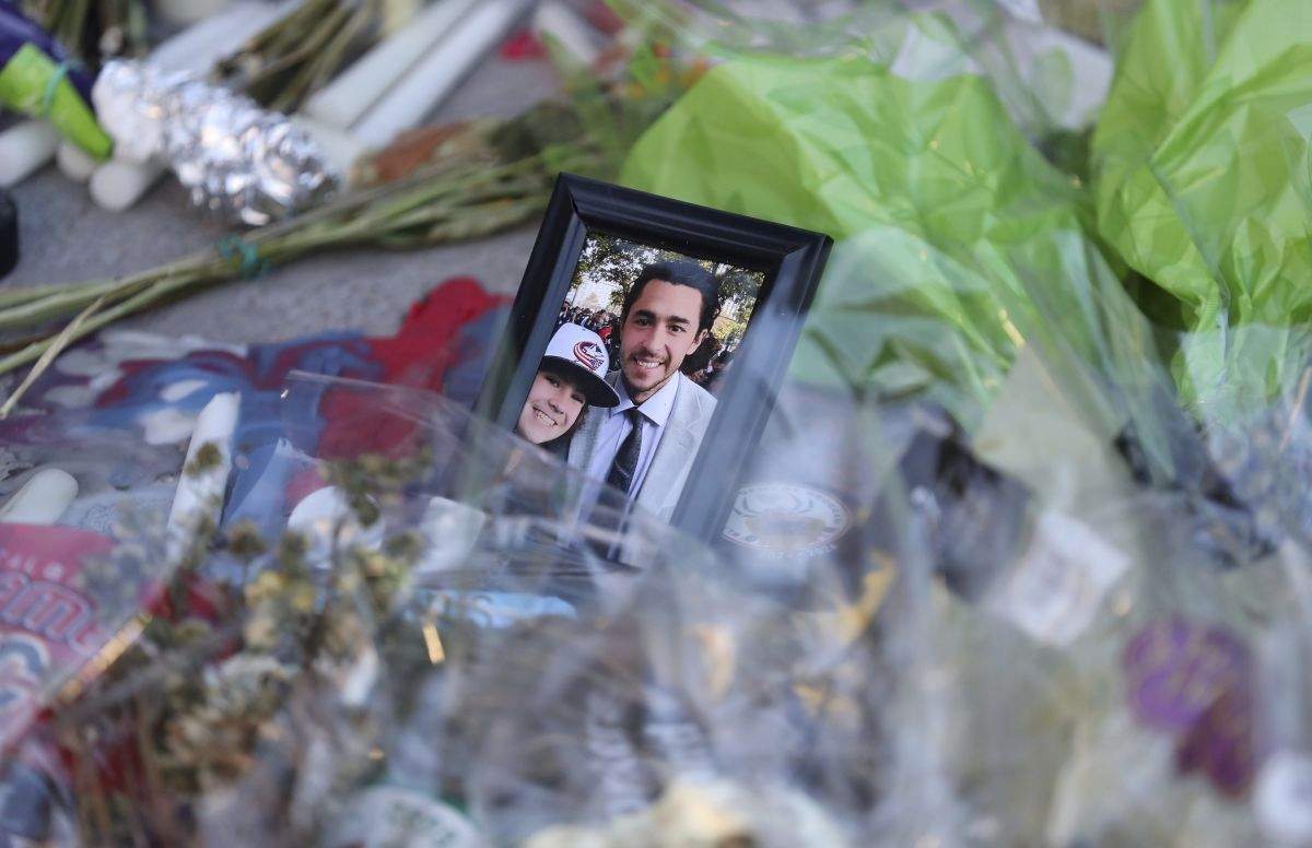 Fans leave mementos as part of the candlelight vigil to honour Columbus Blue Jackets hockey player Johnny Gaudreau, Wednesday, Sept. 4, 2024, outside of Nationwide Arena in Columbus, Ohio. Gaudreau and his brother Matthew were killed by a motor vehicle last week while riding bicycles.