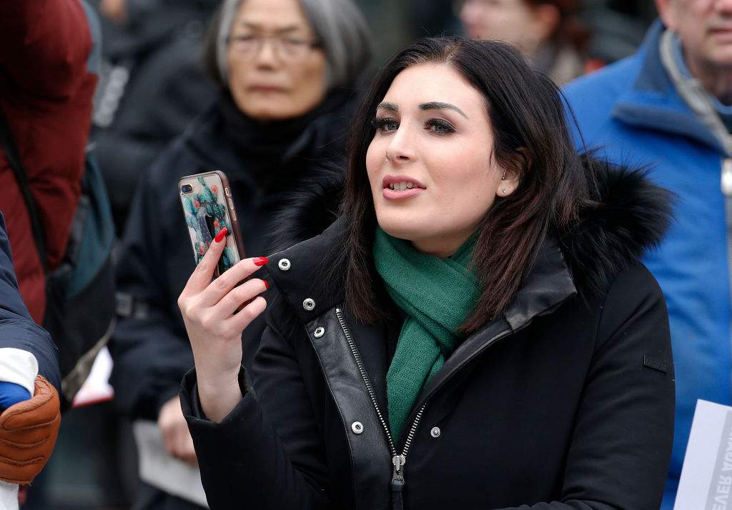 FILE - Political activist Laura Loomer stands across from the Women's March 2019 in New York City on January 19, 2019 in New York City.