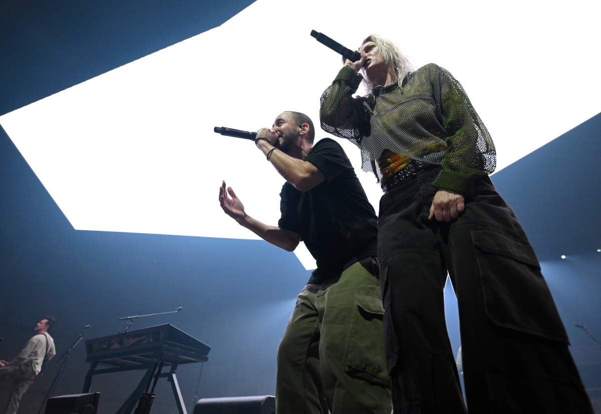 Emily Armstrong and Mike Shinoda on stage.