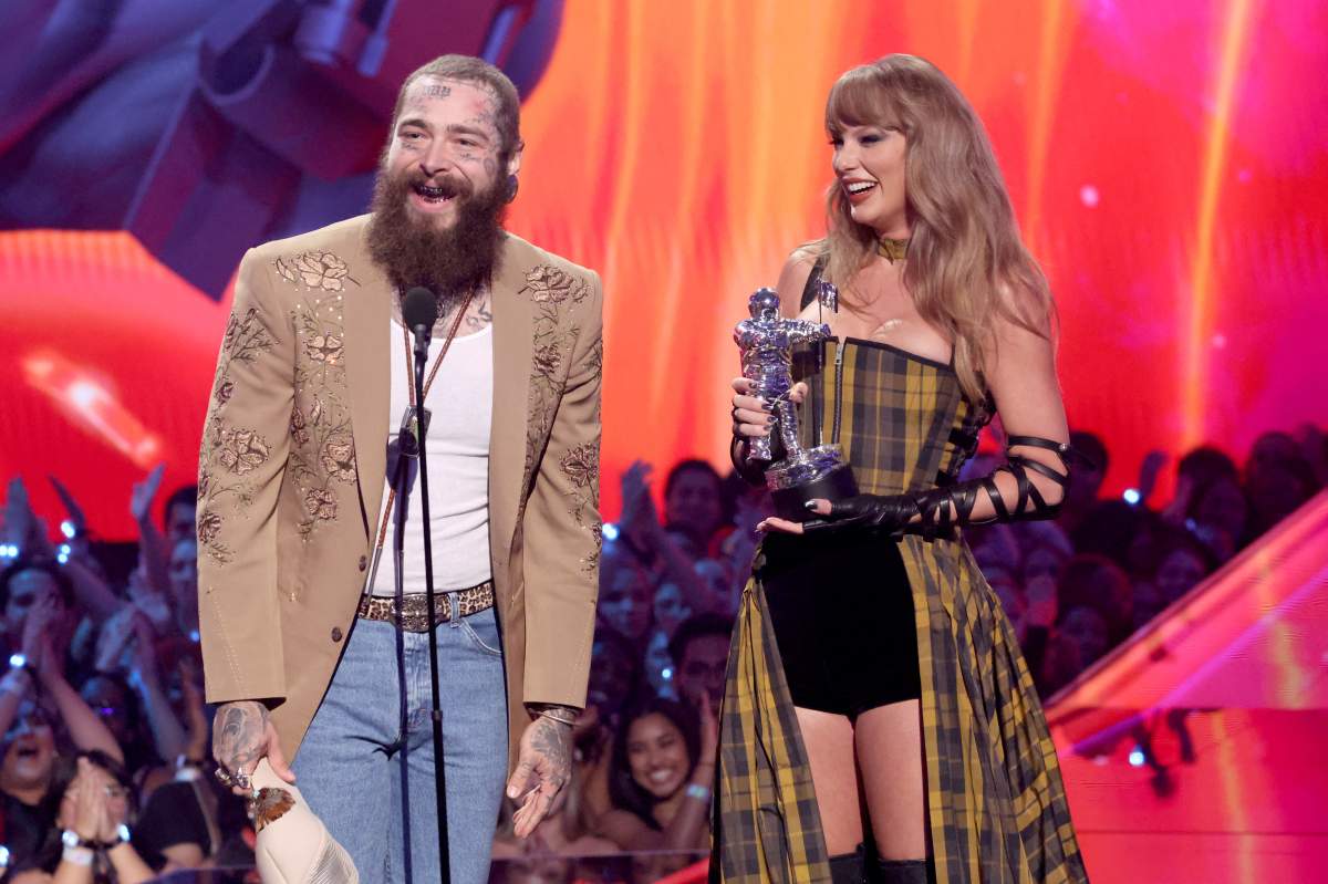 Taylor Swift and Post Malone on stage.