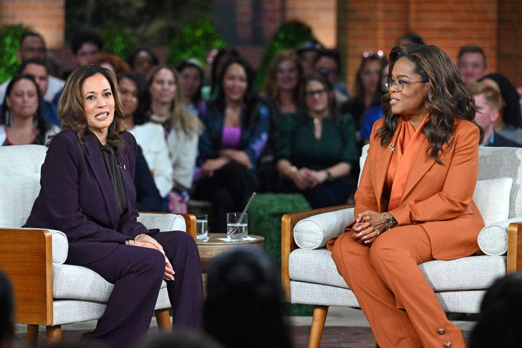 US Vice President and Democratic presidential candidate Kamala Harris (L) joins US television producer Oprah Winfrey at a 'Unite for America' live streaming rally in Farmington Hills, Michigan, on September 19, 2024.