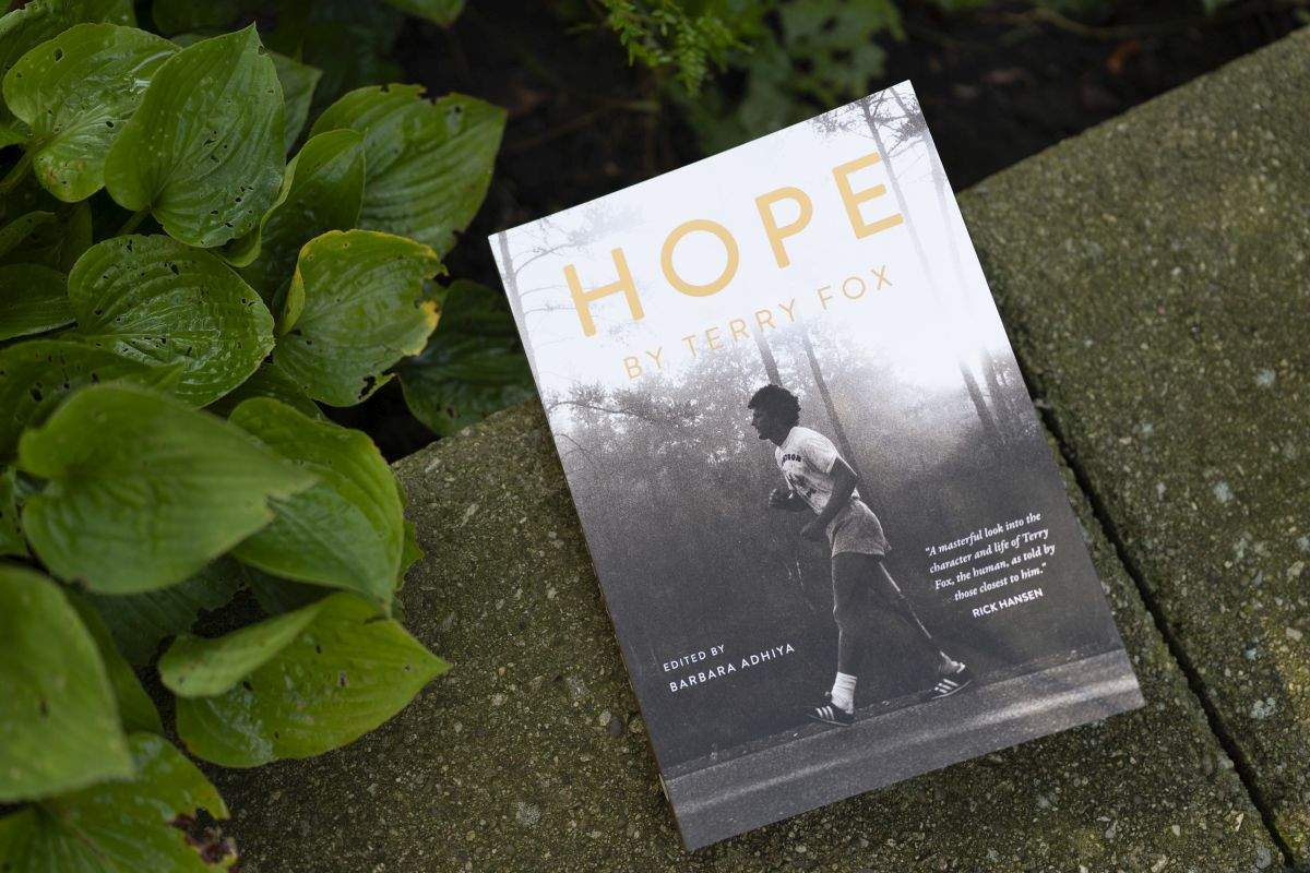 Barbara Adhiya, poses for a photo with her latest book titled, "Hope by Terry Fox" in Toronto on Friday Sept. 13, 2024.