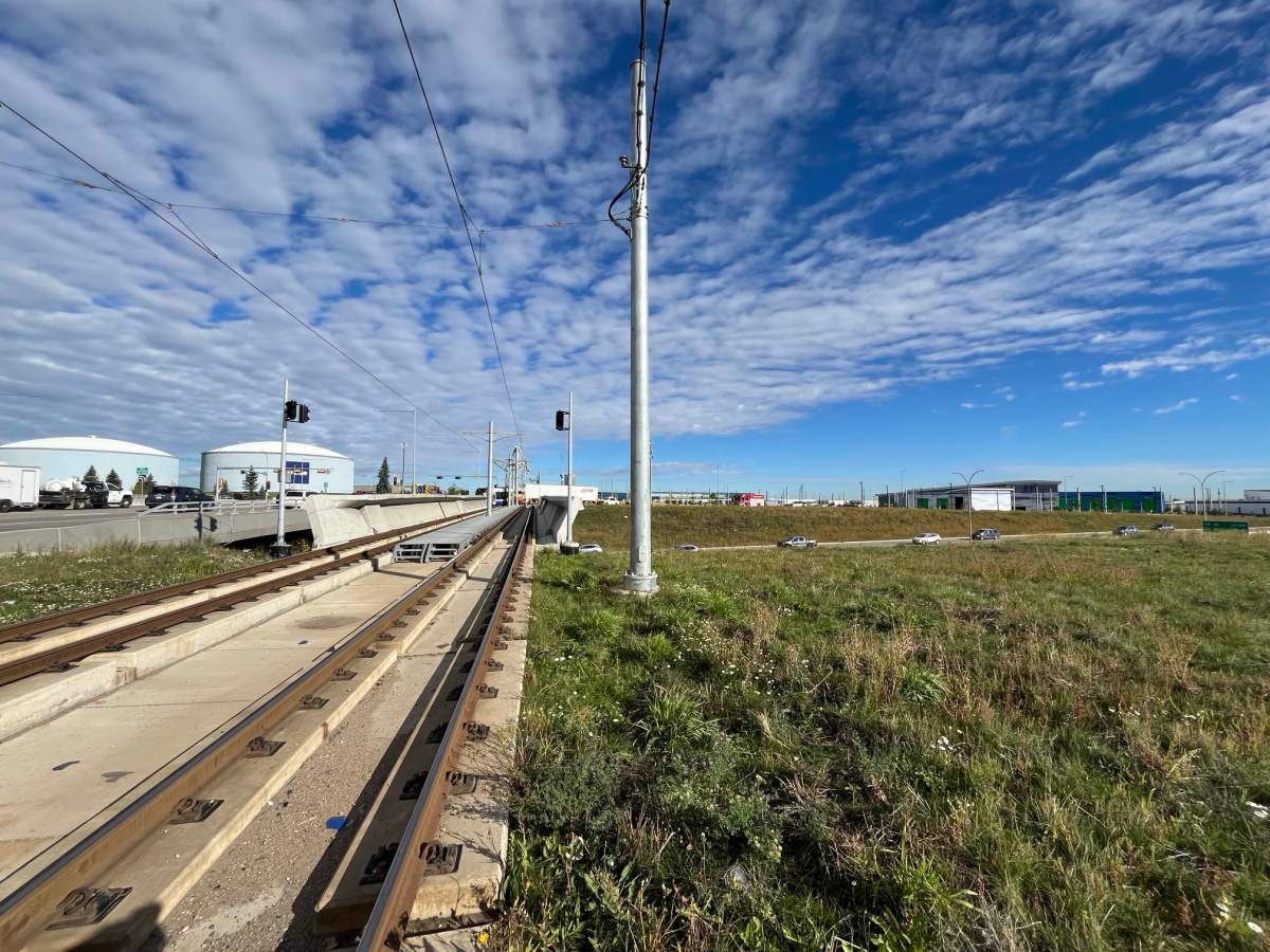 A collision between a semi tractor trailer and the Valley Line LRT on 66/75 Street at the Whitemud Drive overpass on Tuesday, Sept. 24, 2024.