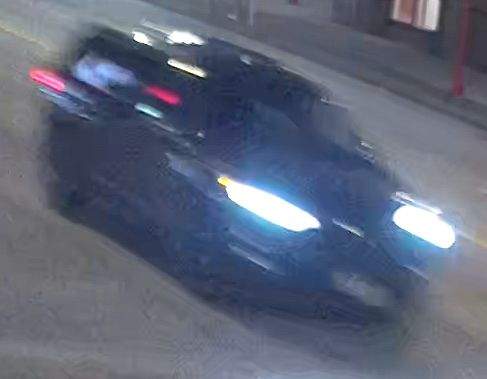 A still photo from the video of a dark SUV travelling in the area of Main Street and Union Street on June 5.