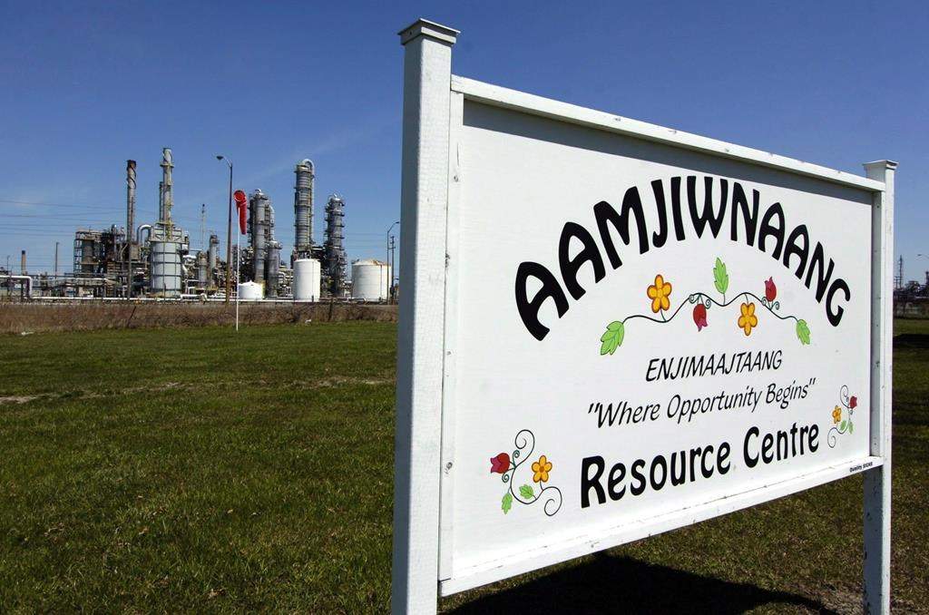 A sign for the Aamjiwnaang First Nation Resource Centre is shown in Sarnia, Ont., on April 21, 2007. A First Nation has recommended some residents evacuate citing the risk of elevated levels of a toxic chemical being removed from a neighboring Sarnia-Ont., plastics plant.