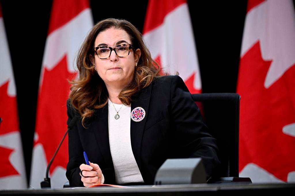 Minister of Mental Health and Addictions Ya’ara Saks listens to questions at a news conference at the National Press Theatre in Ottawa, on Friday, Oct. 11, 2024. The minister of mental health and addictions says there are not enough beds in jurisdictions across the country to support involuntary treatment for addictions and mental health. THE CANADIAN PRESS/Justin Tang