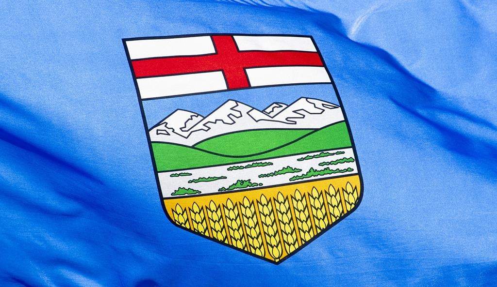 The operator of a pulp mill in northwestern Alberta has been fined $1 million for letting almost 31 million litres of toxic wastewater flow into the Peace River. Alberta's provincial flag flies in Ottawa on July 6, 2020.