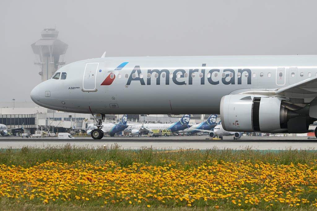 FILE: An American Airlines jet taxis at the Los Angeles International Airport in Los Angeles on April 12, 2024.