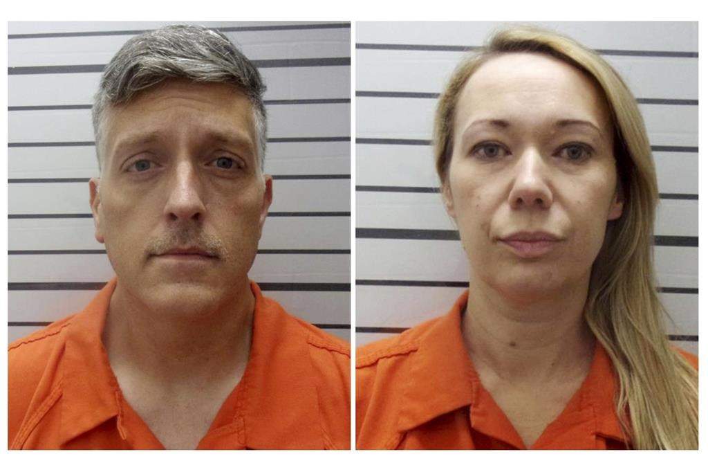 FILE - This combination of booking photos provided by the Muskogee County, Okla., Sheriff's Office shows Jon Hallford, left, and Carie Hallford, owners of Return to Nature Funeral Home. (Muskogee County Sheriff's Office via AP, File).