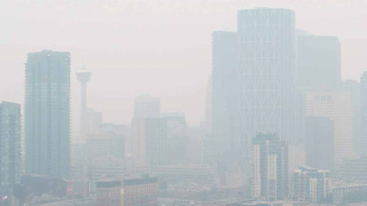 Smoke from wildfires in western Canada obscures the Calgary skyline in July 2024.