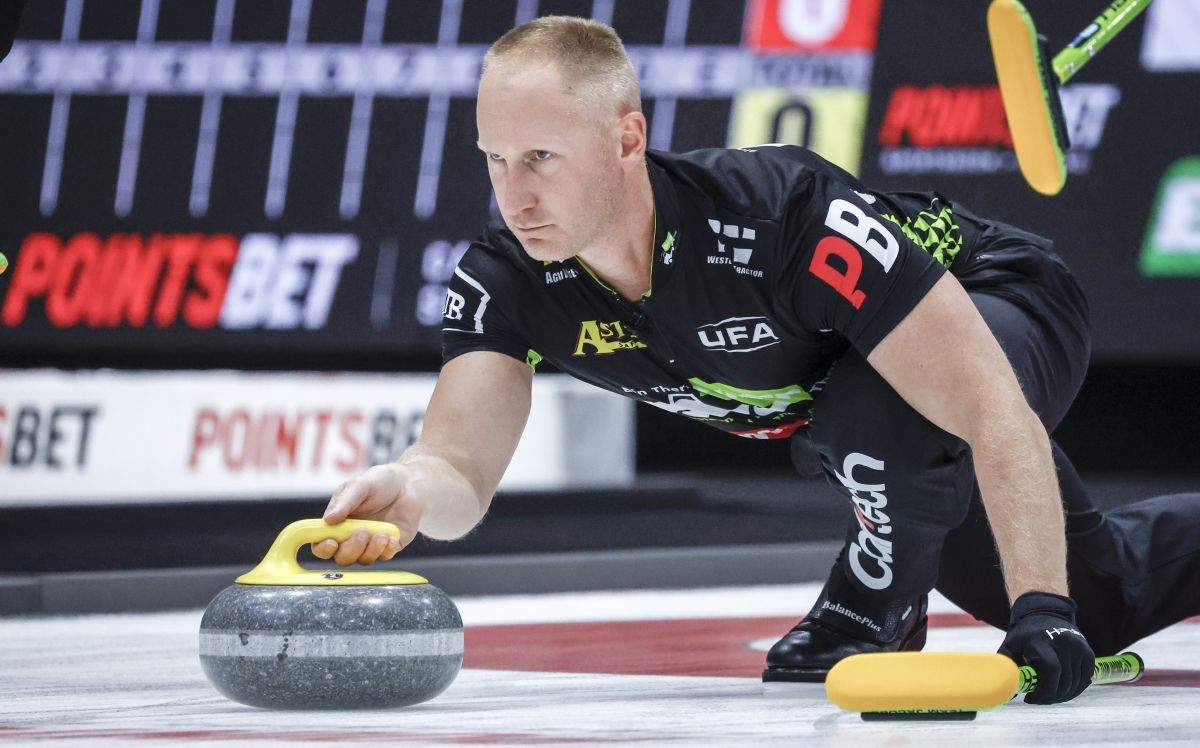 Team Jacobs skip Brad Jacobs delivers a stone during curling action against Team Horgan at the PointsBet Invitational in Calgary on Thursday, Sept. 26, 2024. Brad Jacobs and Bruce Mouat became the first teams to clinch quarterfinal berths at the HearingLife Tour Challenge curling tournament with wins in Thursday's third draw.